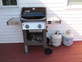 A Weber Spirit 2 Gas Grill With 2 Tanks And Grill Cleaner Accessories