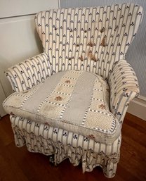 Vintage Wingback Armchair On Casters