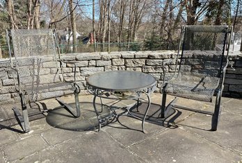 A Pair Of Woodard Wrought Iron Mesh Sling Rockers And A Salterini Cocktail Table