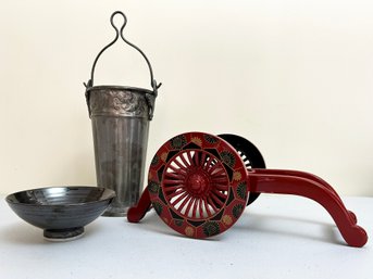 Metal Decor And A Cannon Cart Wine Holder
