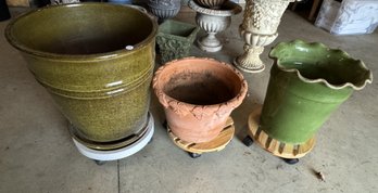 THREE LARGE POTTERY URNS