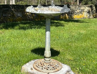 A Vintage Cast Iron Bird Bath