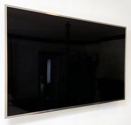 A Samsung 36 Inch Flat Screen TV