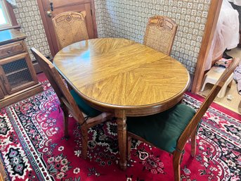 Fruitwood Dining Table With 4 Cane Back Chairs And 2 Leafs