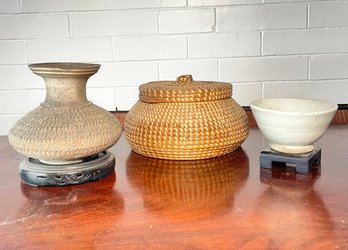 Antique Pottery On Rose Wood Bases And A Lidded Basket