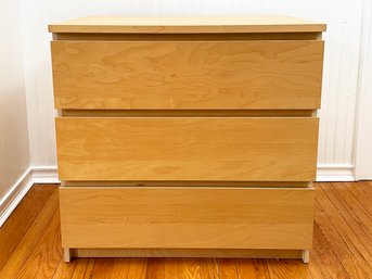 A Composite Nightstand Or Small Dresser