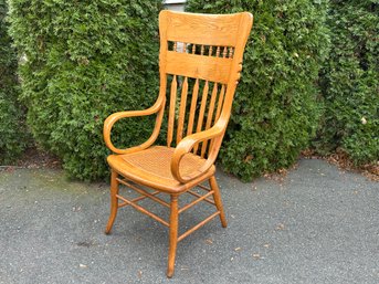 A Vintage Solid Oak High Back Cane Bishops Chair