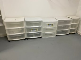 Group Of Clear Plastic Storage Drawers .