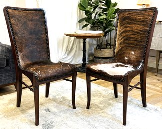 A Pair Of Luxe Modern Cowhide And Nailhead Side Chairs By Theodore Alexander