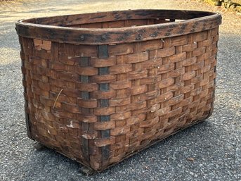 A Large Antique French Woven Laundry Basket