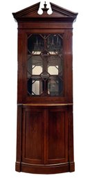 A Stately Federal Revival Corner Cabinet In Paneled Mahogany