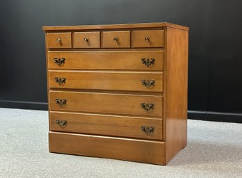 A Small Traditional Chest Of Drawers