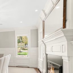 A Large Antique Silver Leaf Framed Mirror