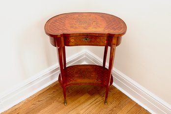 Antique Kidney Shaped Marquetry Floral Accent Side Table With Brass Trim And Lower Shelf
