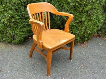 A Solid Oak Desk Chair