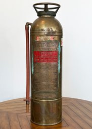 An Antique Brass Kidde Fire Extinguisher