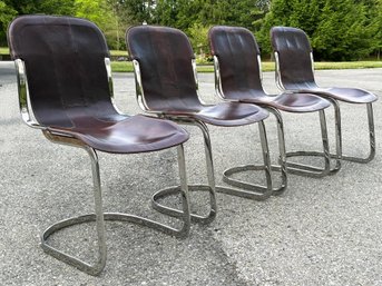 A Set Of 4 Vintage Leather And Chrome Side Chairs By Restoration Hardware