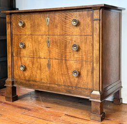 A Petit Chest Of Drawers Or Nightstand By Baker Furniture In Crotch Mahogany Veneer