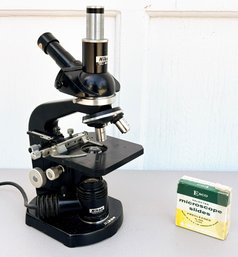 A Vintage Nikon Microscope With Esco Slides