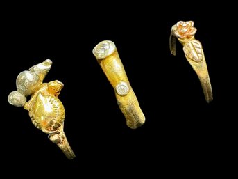 Grouping Of Gold And Gold Plated Rings Of Three