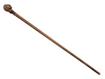 A Vintage Native American Motif Carved Walking Stick