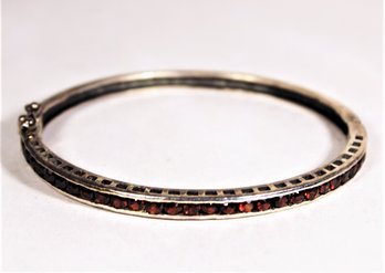 Vintage Sterling Silver Hinged Bangle Bracelet Having Red Glass Channel Set Stones