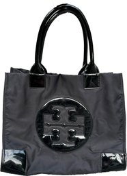 A Patent Leather And Nylon Tote By Tory Burch