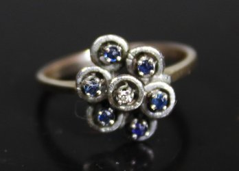 Sterling Silver Ladies Ring Having Small Blue Sapphires And Tiny Diamond Size 6