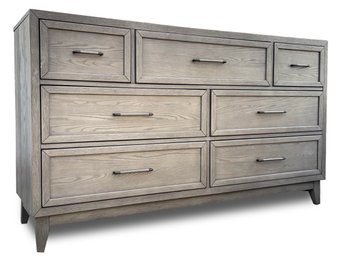 A Modern Dresser In Paneled Sun Bleached Oak Finish