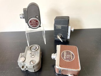 Four Vintage 8mm Movie Cameras Including Bell & Howell And Univex Cinemaster II