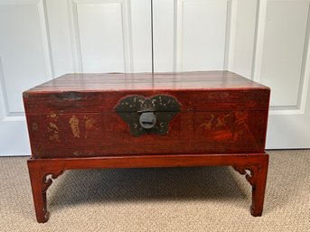 A Beautiful Antique Red Trunk On Base