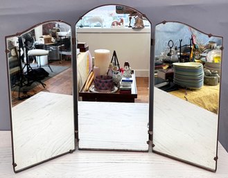 A Vintage Tri-Fold Vanity Mirror