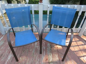Pair Of Outdoor Stack Blue Chairs