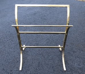 A Contemporary Brass Finish Quilt Rack