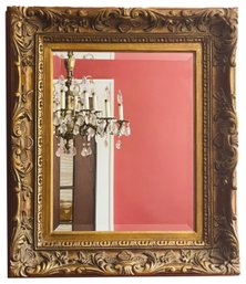 Carved And Gilded Beveled Mirror