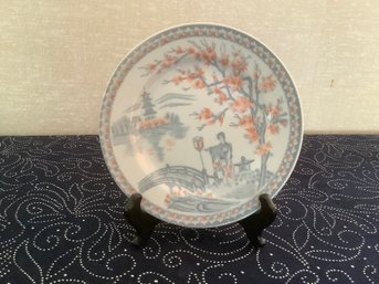 Grey And Orange Decorative Plate