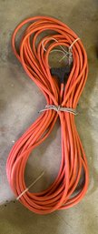 Very Larger Orange Color Extension Cord.