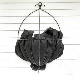 A Wrought Iron Wall Hanging Planter