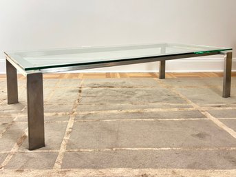 A Danish Modern Brushed Steel And Glass Coffee Table