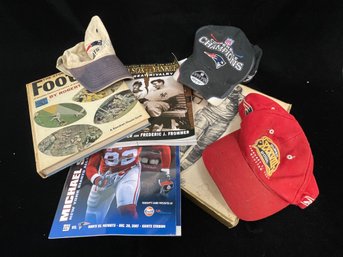 Collection Of Football Books And Hats