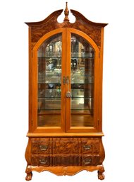 A Burl Wood Bombe Form Lighted Curio Cabinet