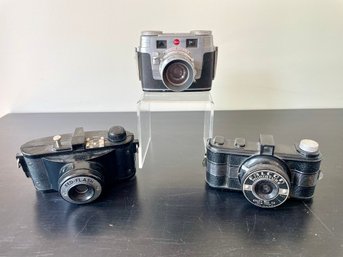 Three Vintage Cameras Including Fed-Flash, Kodak Signet 35, Falcon Miniature 127
