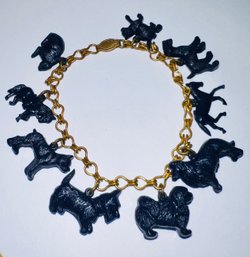 VINTAGE NAVY BLUE PLASTIC ANIMAL CHARM 7' GOLD TONE BRACELET