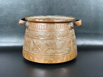 A Vintage Double-Handled Moroccan Pot In Copper With An Intricate Embossed Pattern