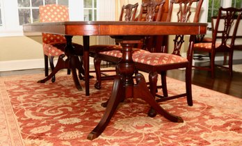 Rectangular Banded Dining Table With Double Vase Pedestals And Chippendale Upholstered Chairs