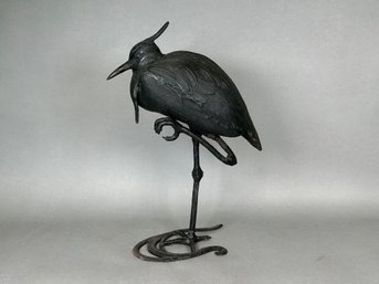 A Cast Iron Crow Figure