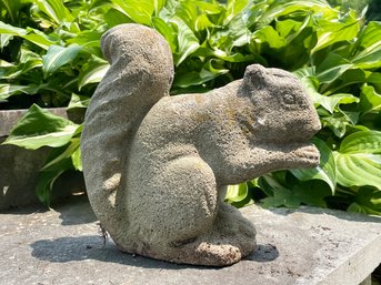 A Cast Stone Squirrel