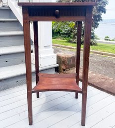 An Antique Mahogany Telephone Or Side Table