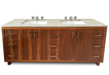 A Modern Hard Wood Bathroom Vanity With Marble Top, Porcelain Sinks And High End Fittings