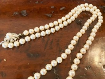 An Authentic Vintage Pearl Necklace With Sterling Clasp